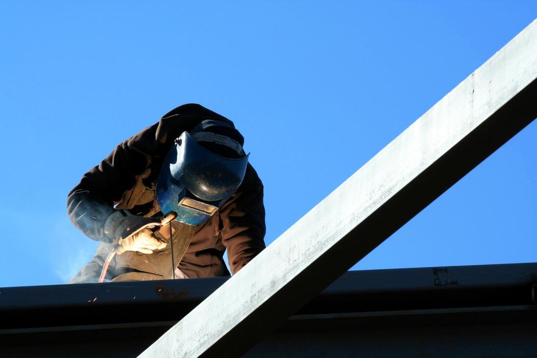 Installing the new roof by our expert welder