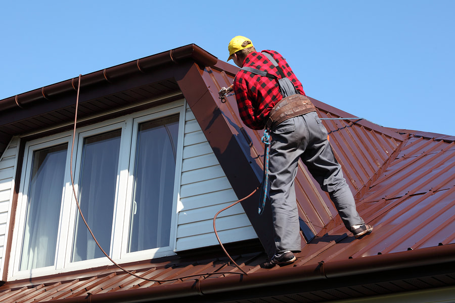 Painting the roof by our professional team